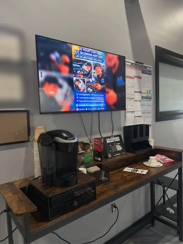 Coffee bar with a single-cup coffee maker and TV