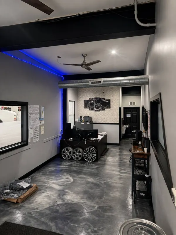 Customer lobby with blue accent lighting and the service desk